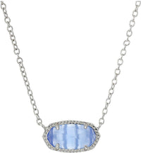 gold plated necklace featuring a blue stone centerpiece and delicate chain design.